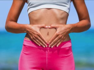 women with happy tummy after colonic cleanse at Flow Hydrotherapy in Toronto